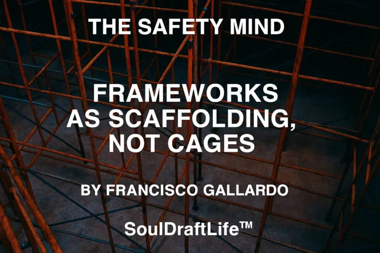 Scaffolding arranged like a labyrinth in red, orange, and blue tones, symbolizing frameworks as supportive structures rather than cages.