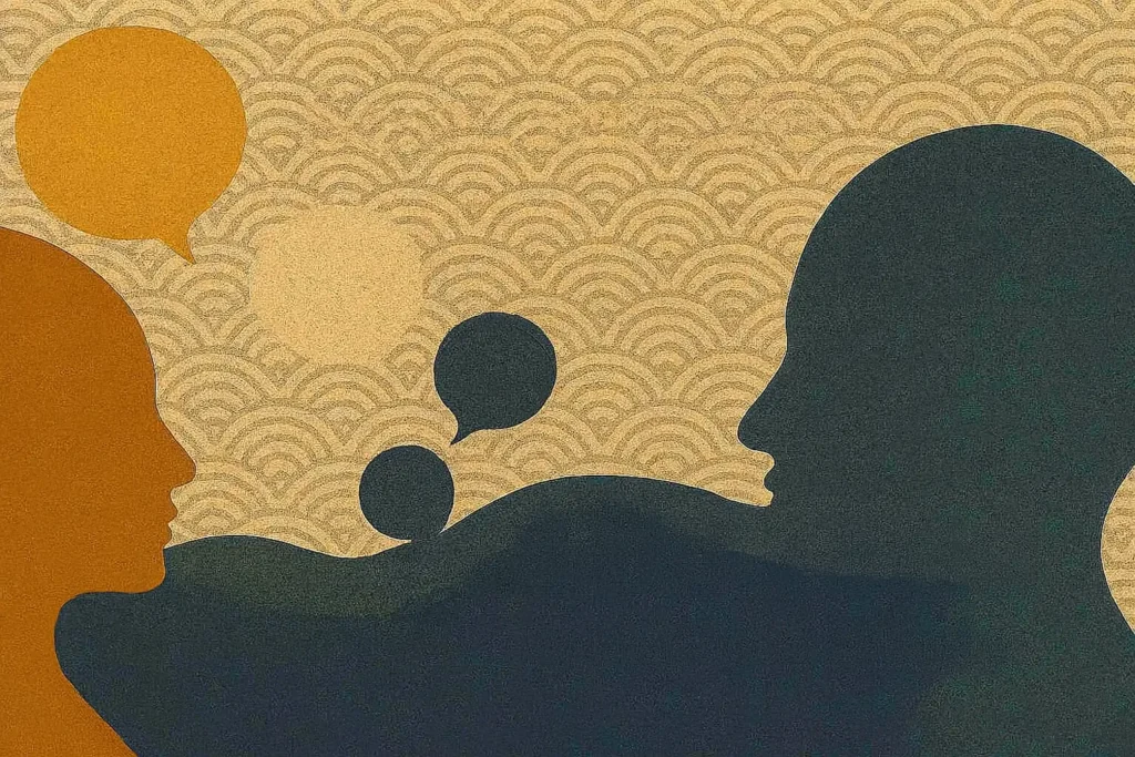 SoulDraftLife™ banner two silhouetted profiles facing each other with textured speech bubbles over a golden Seigaiha wave background, symbolizing dialogue and reflection.